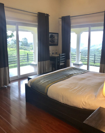 Master Bedroom with Private Walk-Out Veranda for Tranquil Escapes in Kotagiri