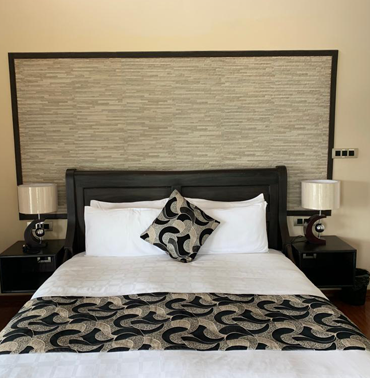 Modern Comfort Experience Serenity in Farview Resort's Bedroom in Kotagiri